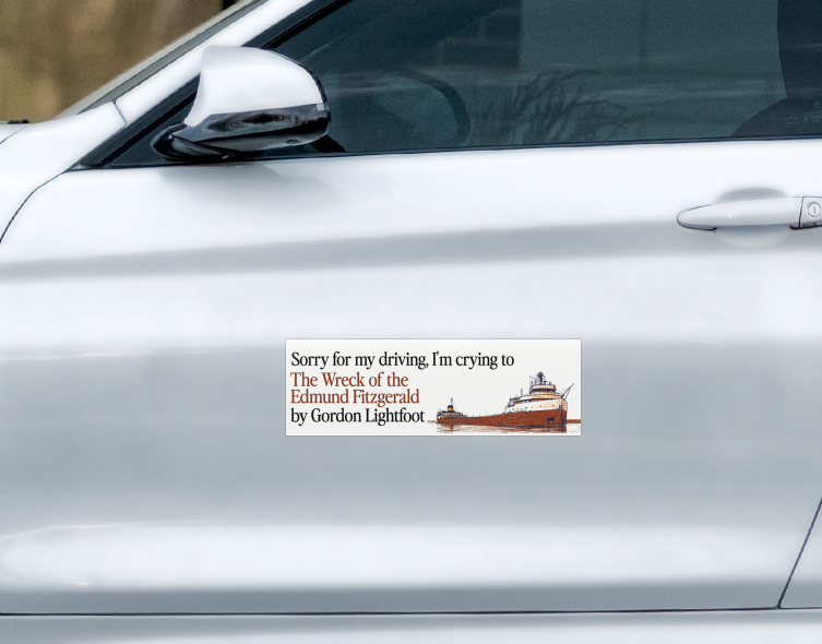 Weatherproof The Wreck of the Edmund Fitzgerald Car Magnet featuring a freighter illustration and text that reads, Sorry for my driving, I’m crying to The Wreck of the Edmund Fitzgerald by Gordon Lightfoot.
