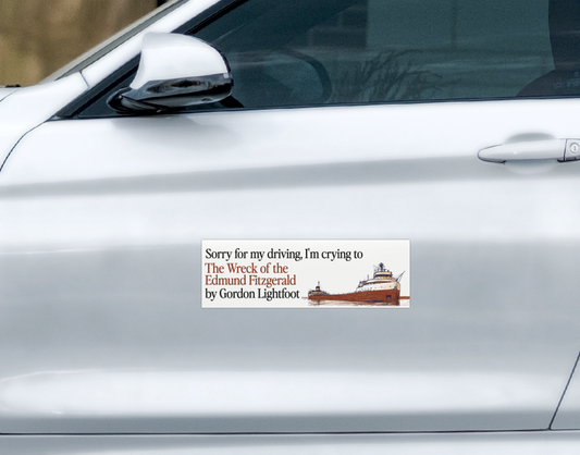 Weatherproof The Wreck of the Edmund Fitzgerald Car Magnet featuring a freighter illustration and text that reads, Sorry for my driving, I’m crying to The Wreck of the Edmund Fitzgerald by Gordon Lightfoot.