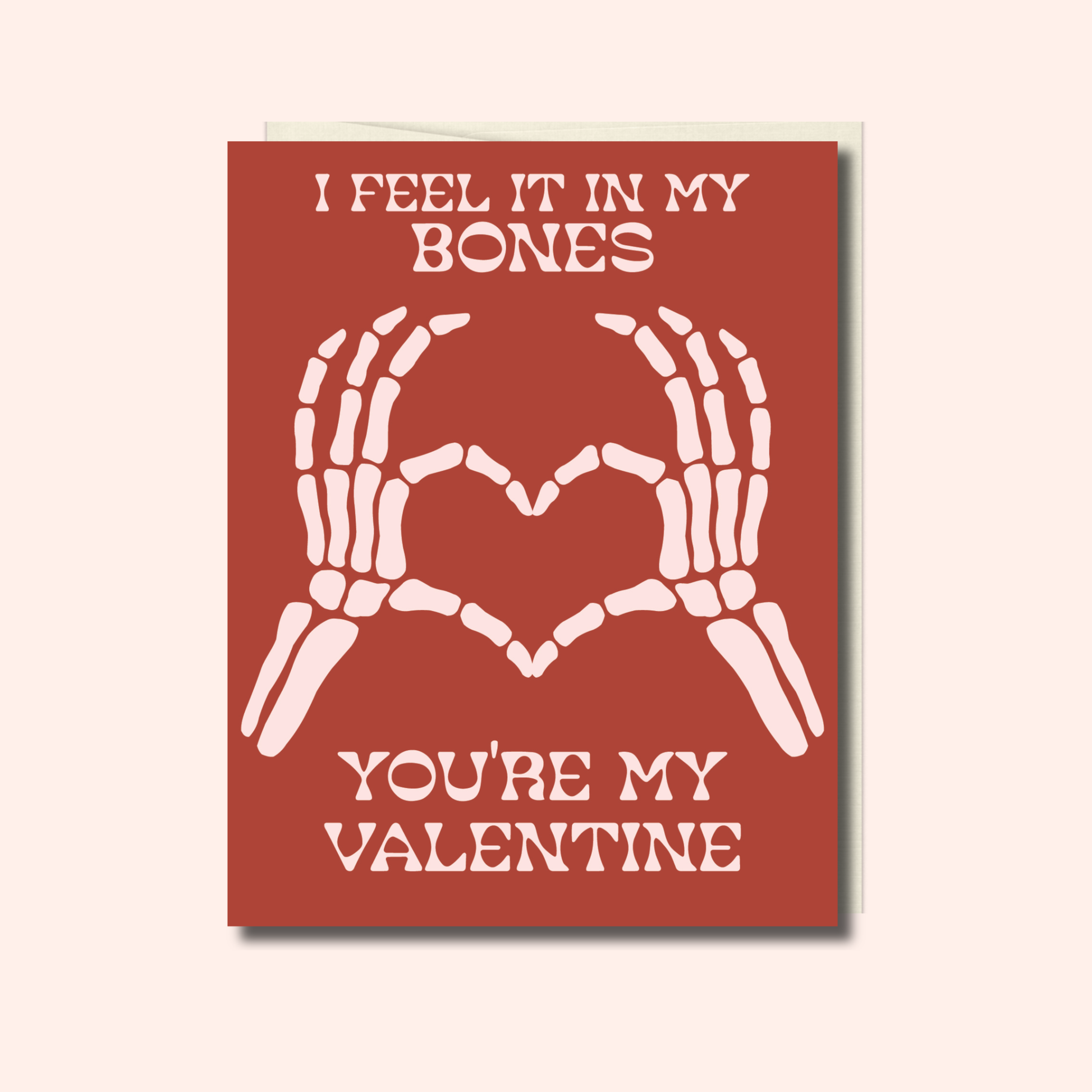Surprise your Valentine with the “Feel It In My Bones – Valentine’s Day Card” from Ghost Poppy. Featuring vibrant red cardstock and striking white skeleton hands forming a heart, this quality card reads “I feel it in my bones, you’re my Valentine” on the front. The inside is left blank for your personal heartfelt message.